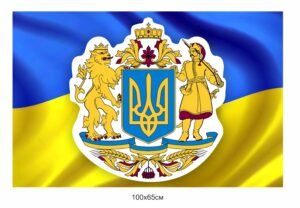Стенд “Великий герб України” на фоні прапору
